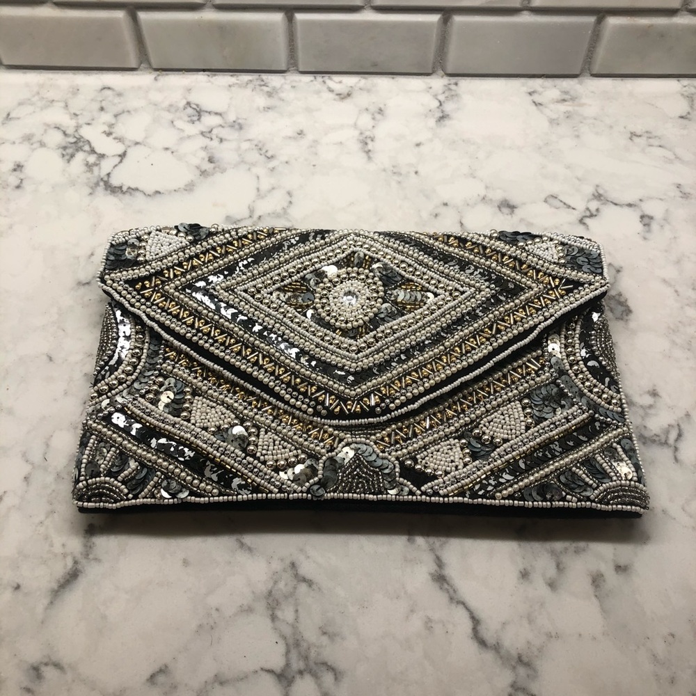 Embellished clutch/ cross over bag